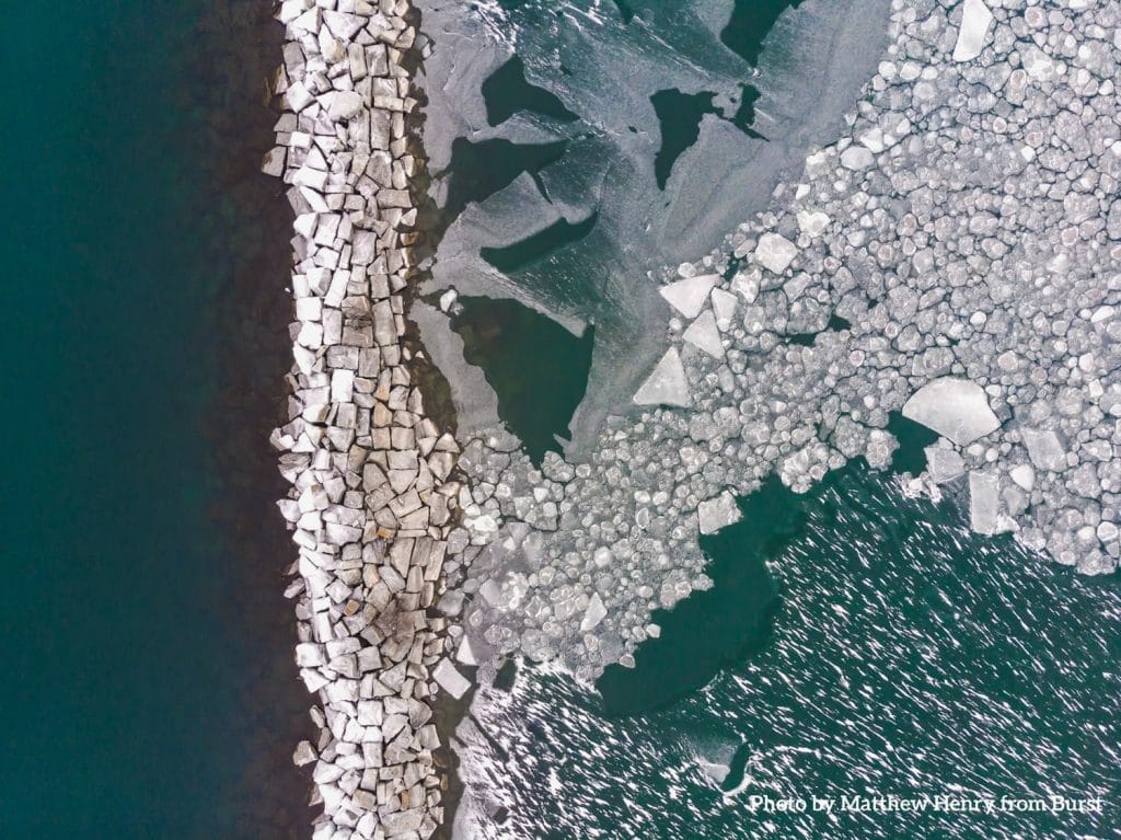 rocks-on-the-water-surrounded-by-ice_v2